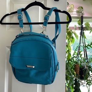 Multi function wearable mini backpack, purse, crossbody it’s adjustable NEW!